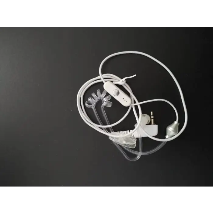 White wired earpiece with a clear acoustic tube.