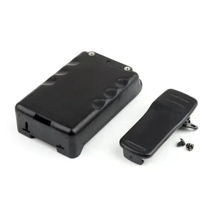 Black plastic electronic device with a detachable clip and small screws.
