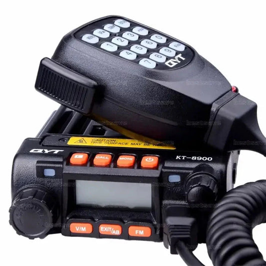 Black dual-band mobile radio with a detachable speaker microphone.