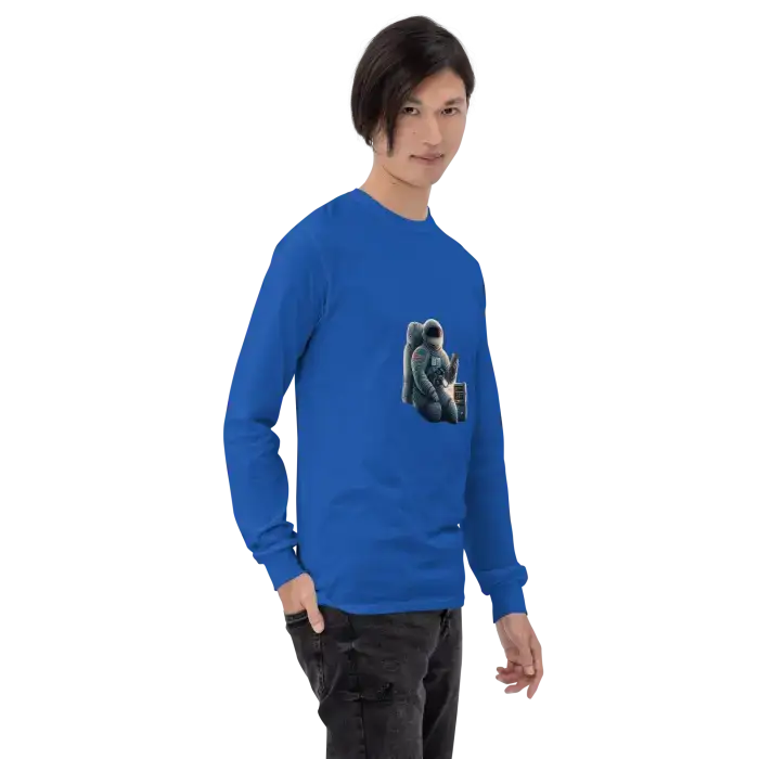Blue long-sleeved shirt with astronaut graphic.