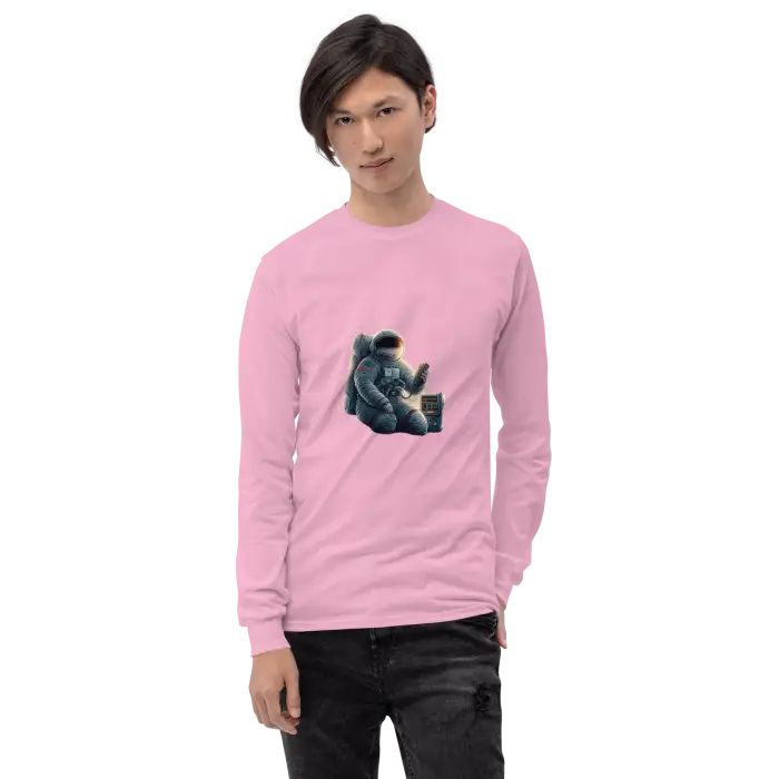 Pink long-sleeved shirt with astronaut graphic.