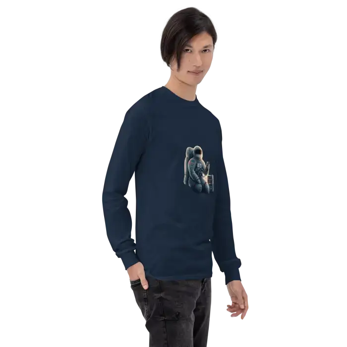 Navy long-sleeved shirt with astronaut graphic.