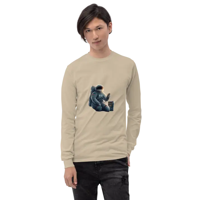 Beige long-sleeved shirt with astronaut graphic.