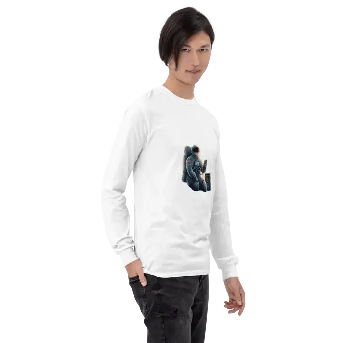 White long-sleeved shirt with astronaut graphic.