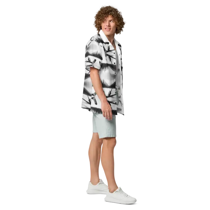 Man in patterned shirt and shorts.