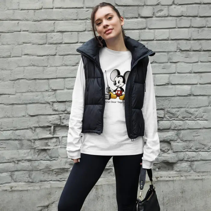 Woman wearing a black puffer vest.