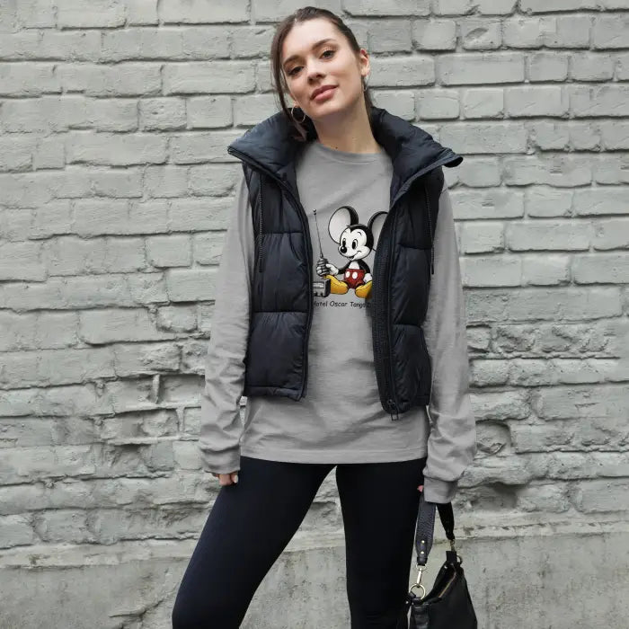 Woman wearing a black puffer vest.