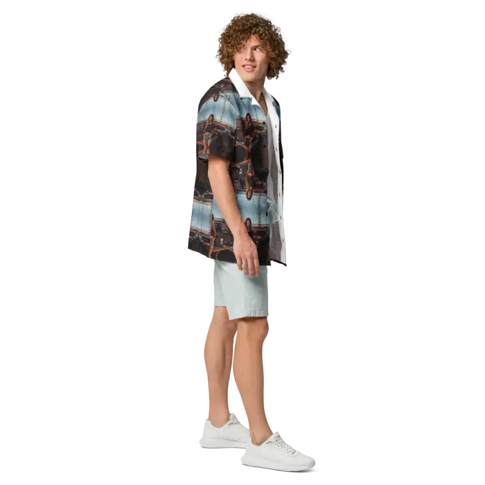 Man in patterned shirt and shorts.