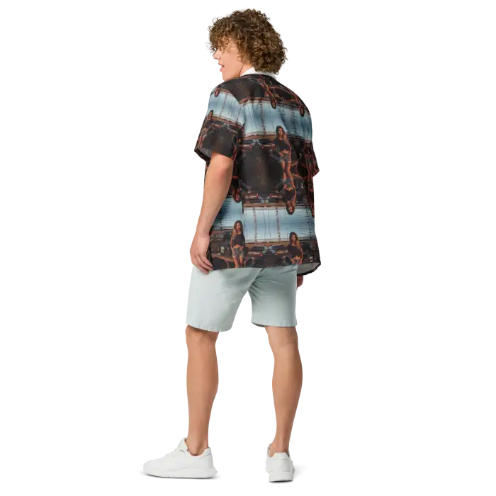Man in patterned shirt and shorts.