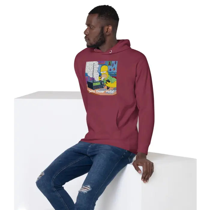 Maroon hoodie with cartoon graphic.