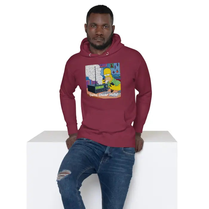 Maroon hoodie with cartoon graphic.