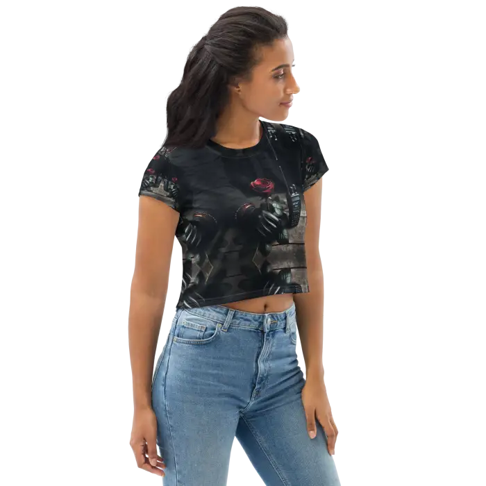 Woman wearing a patterned crop top and jeans.