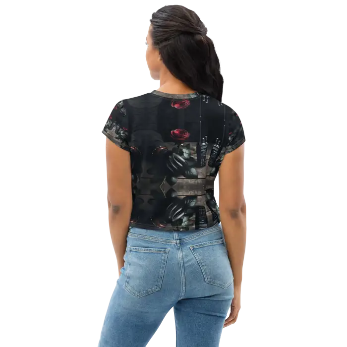 Woman’s printed crop top and jeans.
