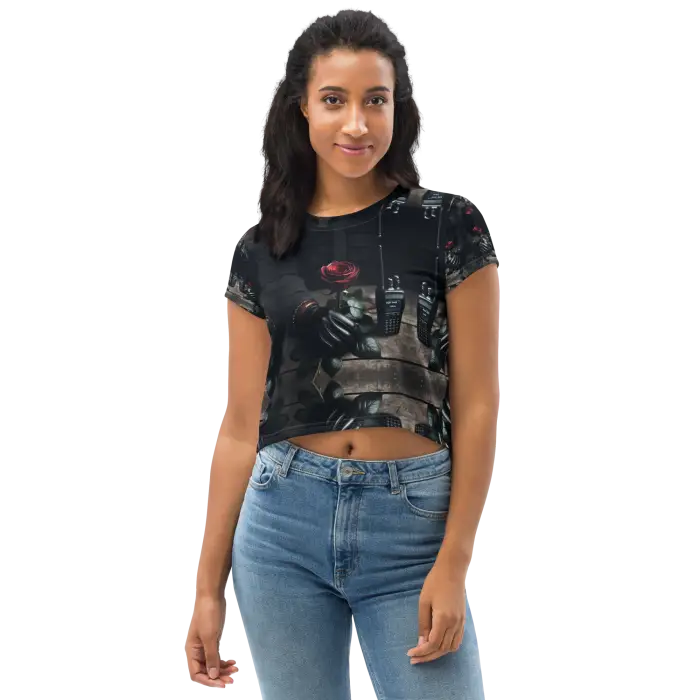 Woman wearing a printed crop top and jeans.