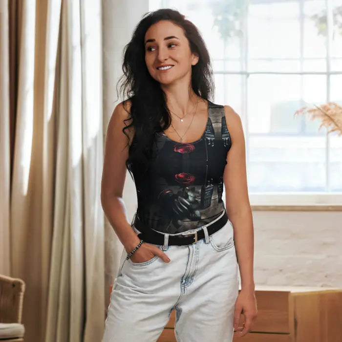 Woman in printed tank top and jeans.