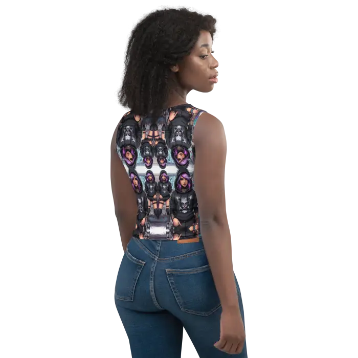 Woman wearing a patterned crop top and jeans.