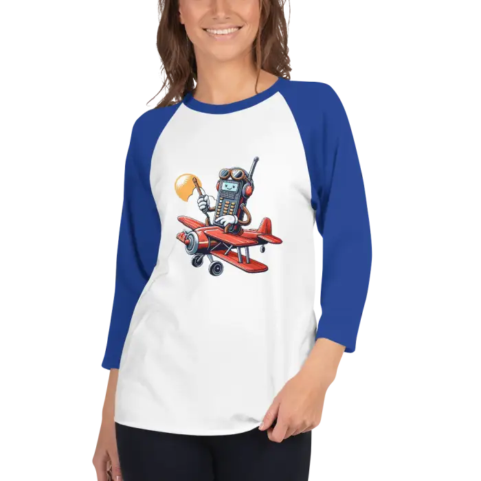 White and blue raglan shirt with cartoon graphic.