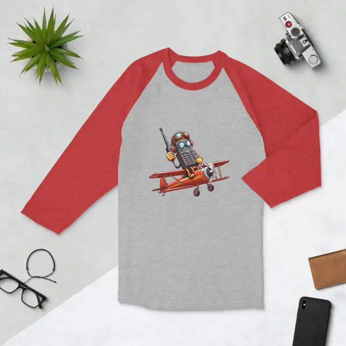 Red and gray baseball tee with cartoon airplane graphic.