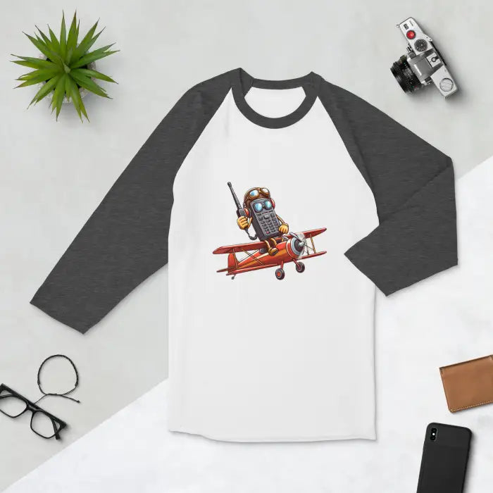 Raglan shirt with cartoon airplane design.