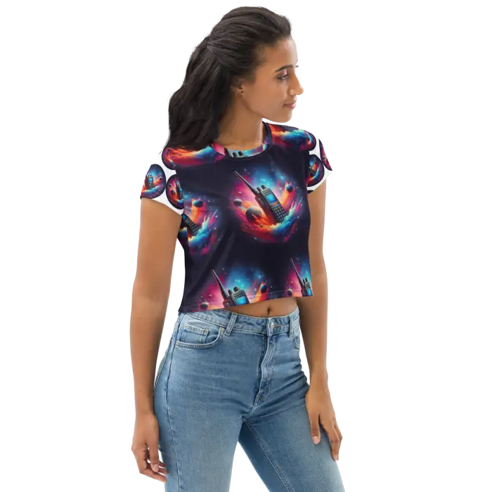 Woman wearing a patterned crop top and jeans.
