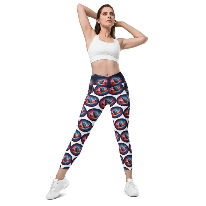 Woman wearing patterned leggings and a sports bra.