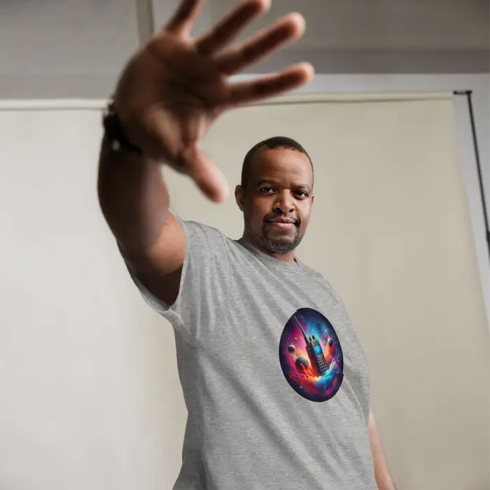 Man’s gray t-shirt with colorful space design.