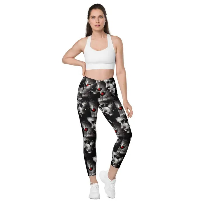 Woman wearing patterned leggings and a sports bra.