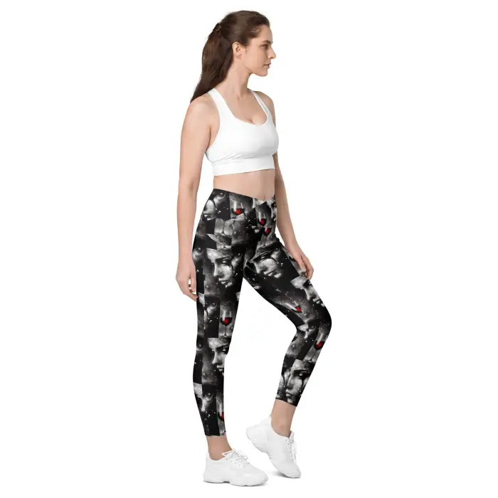 Woman wearing patterned leggings and a white sports bra.