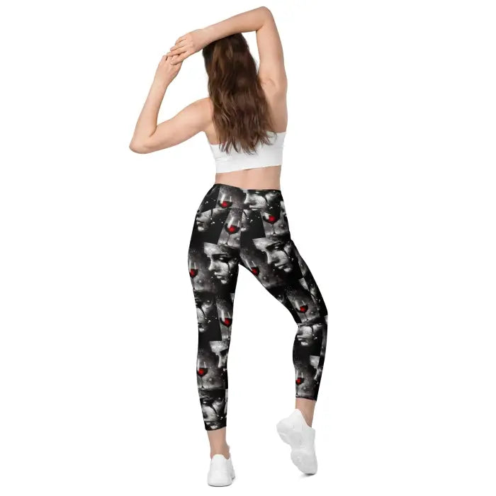 Woman wearing patterned leggings.