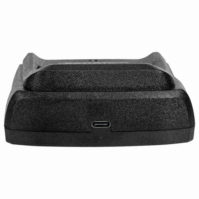 Black charging cradle with USB-C port.