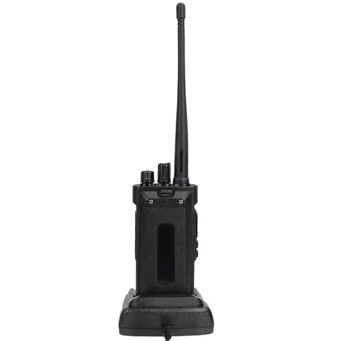 Black two-way radio with charging base.