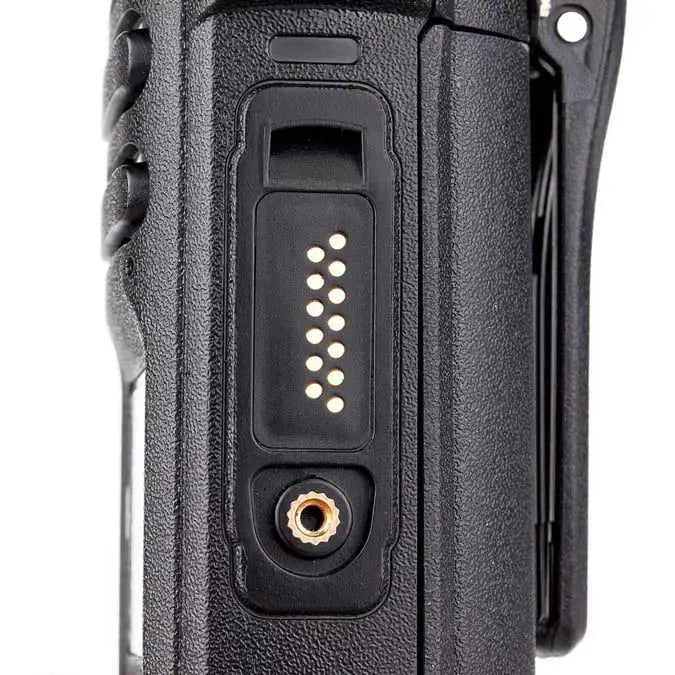 Black two-way radio with charging port.