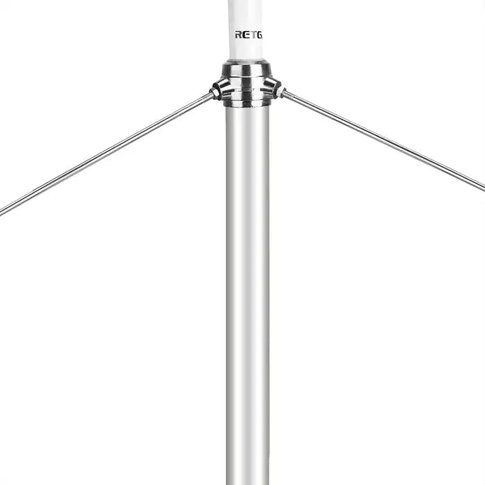 Silver metal pole with support wires.