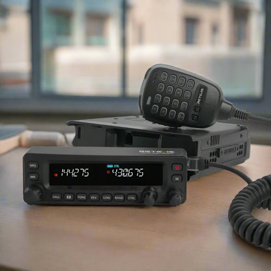 Black two-way radio with microphone.