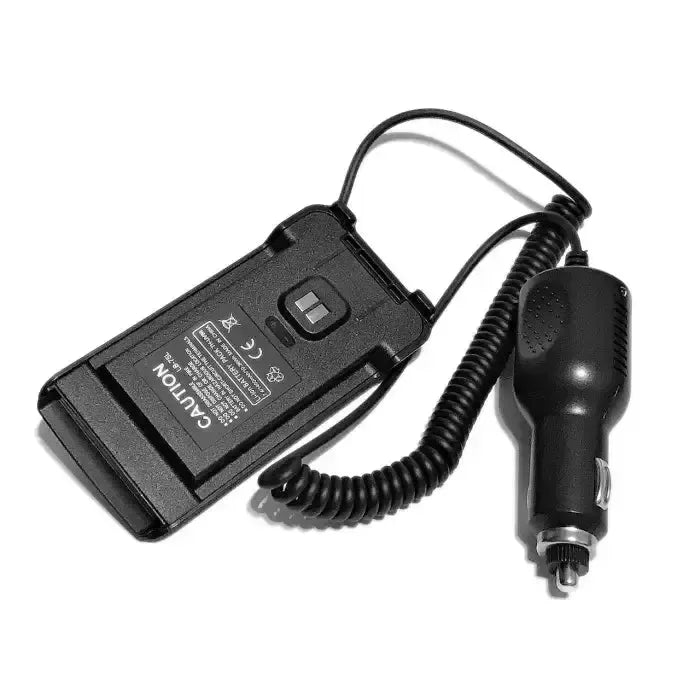 Car charger adapter for a mobile device with a coiled cord.