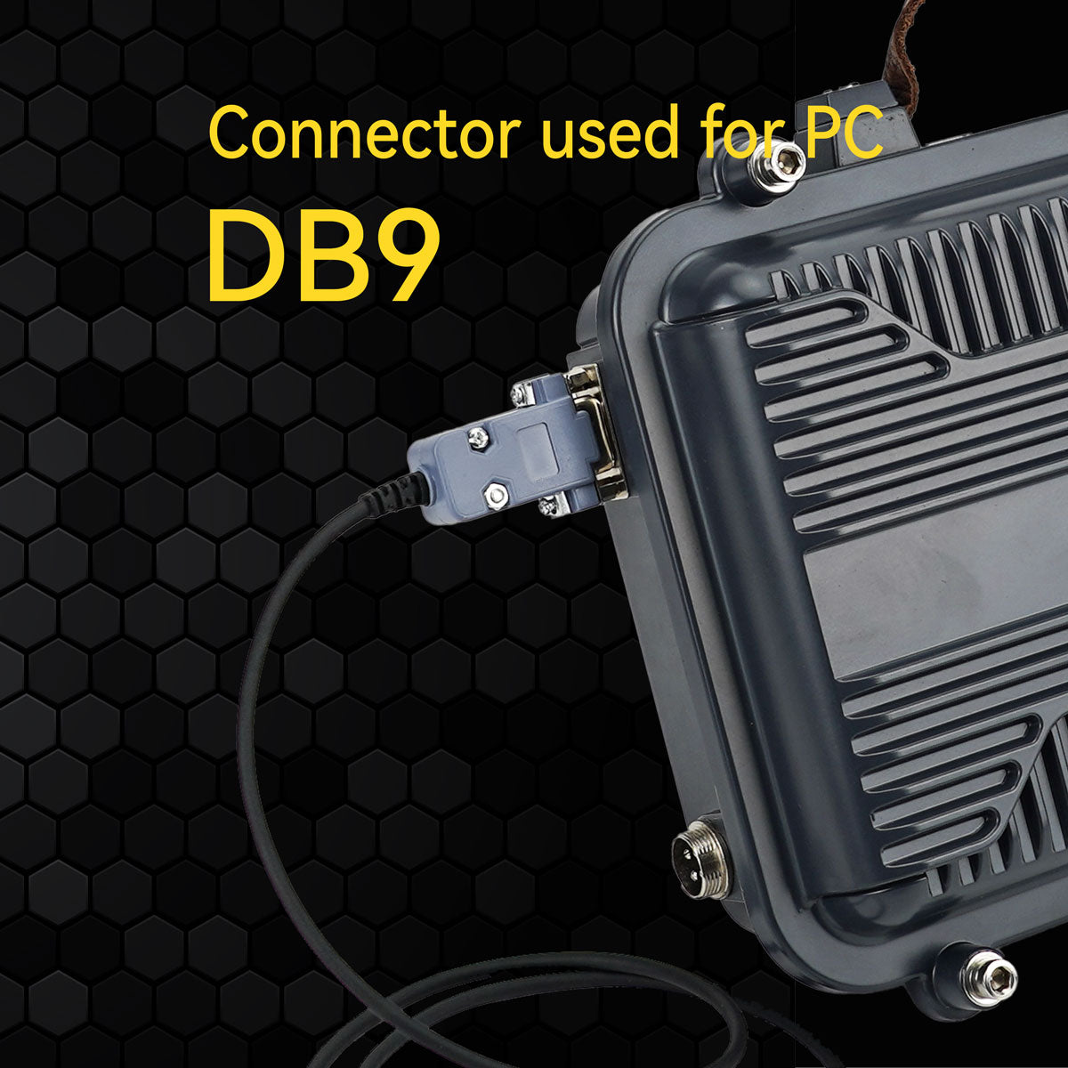 DB9 connector plugged into a gray box.