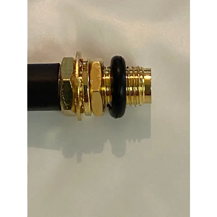 Gold-colored coaxial cable connector with black O-ring.