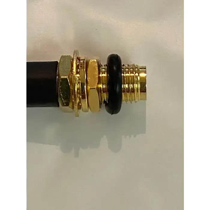 Gold-colored coaxial cable connector with black O-ring.