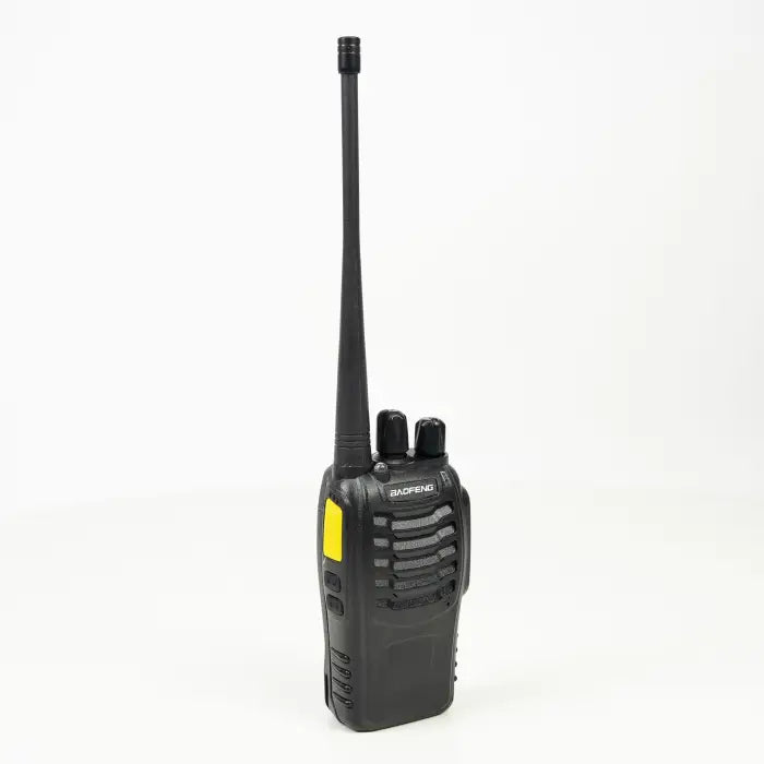Black two-way radio with antenna.