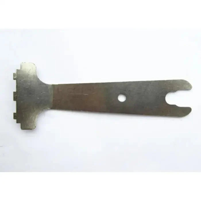 Metal multi-tool with toothed edge and slotted end.