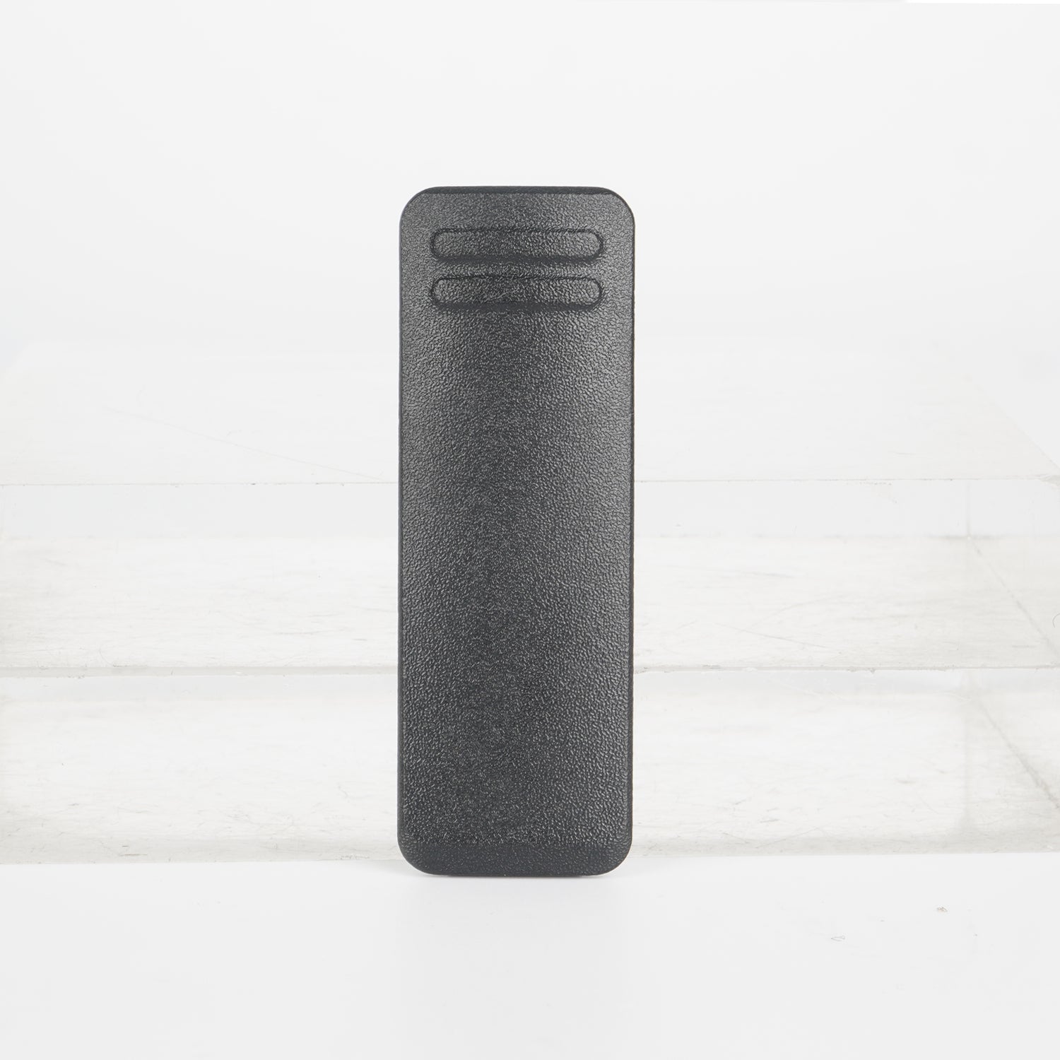 Charcoal gray textured remote control with a minimalist design and two buttons.