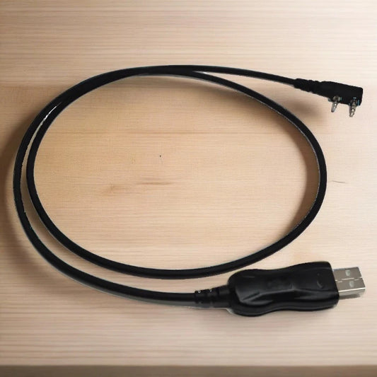 Black USB programming cable.