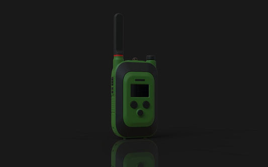 A green and gray walkie-talkie on a dark background.