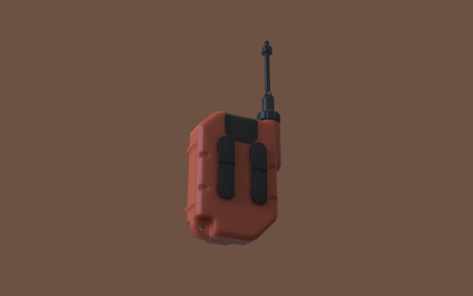 Orange walkie-talkie with black accents on brown background