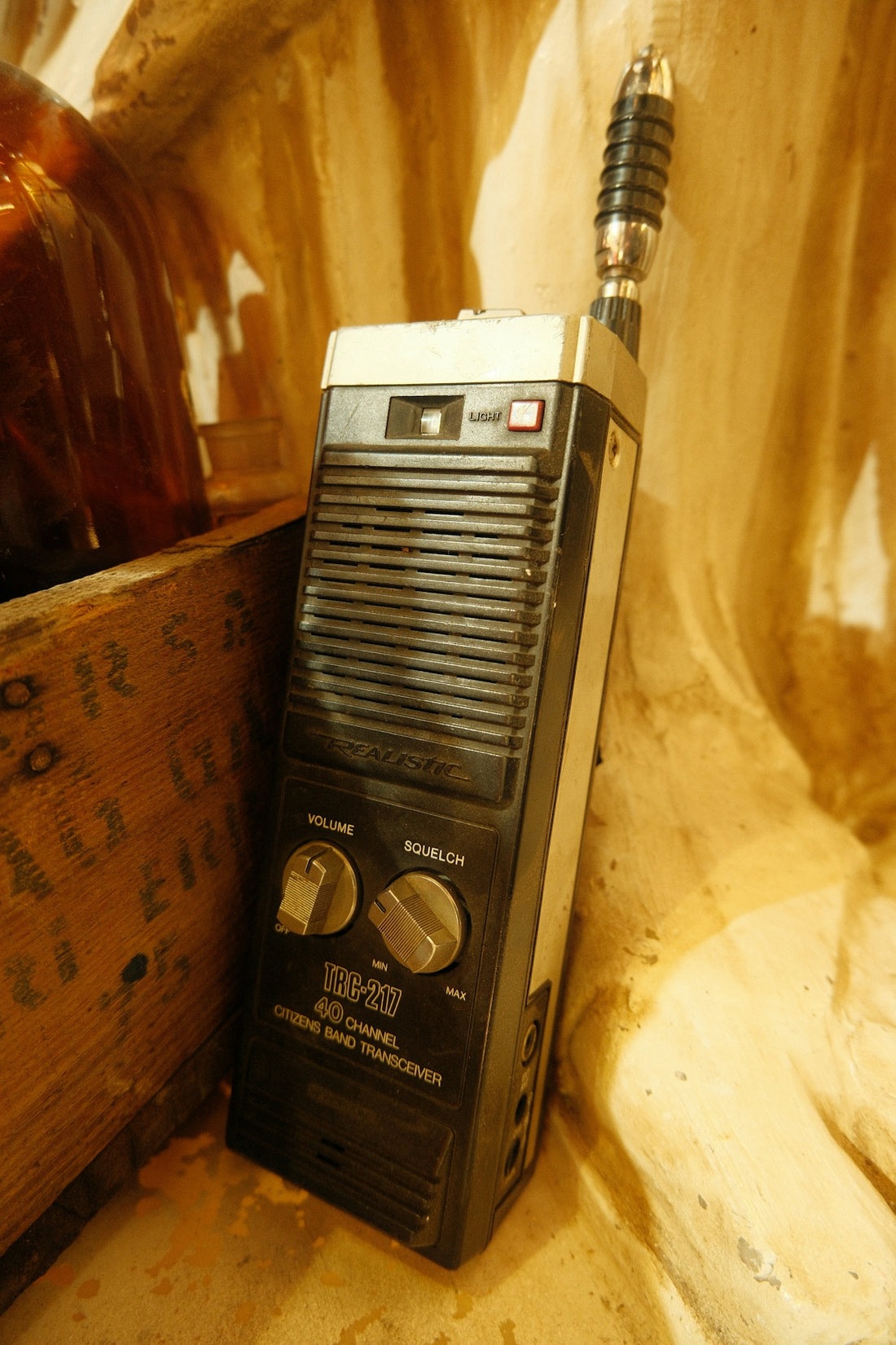 Vintage two-way radio with antenna and knobs