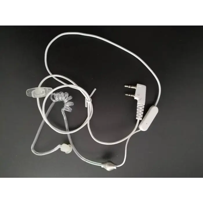 White surveillance earpiece with clear acoustic tube.