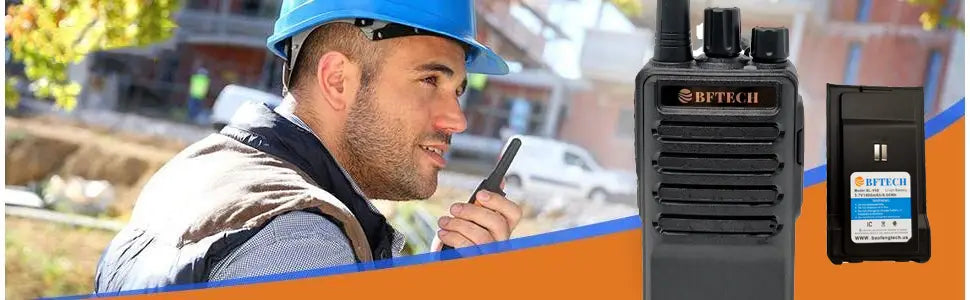 Construction worker using bf-v8s walkie talkie with charging dock for communication