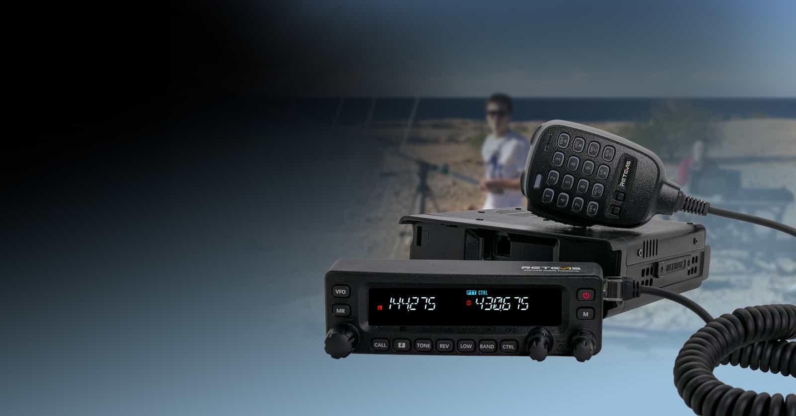 Black Retevis MA1 mobile ham radio with detachable front panel and microphone.
