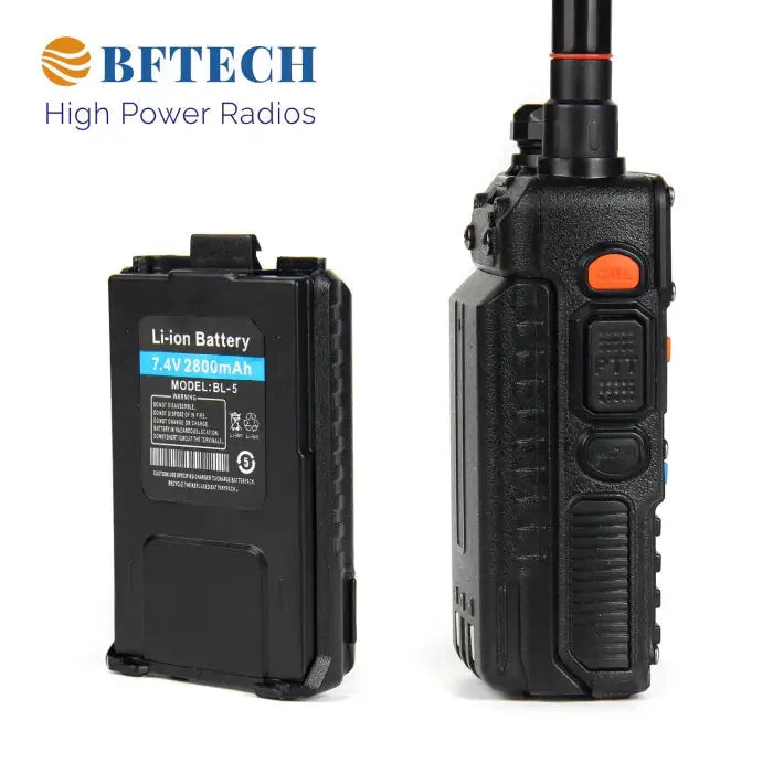 Black two-way radio with a detachable lithium-ion battery.