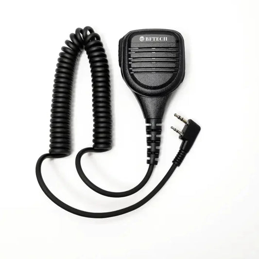Black two-pin speaker microphone with a coiled cord.